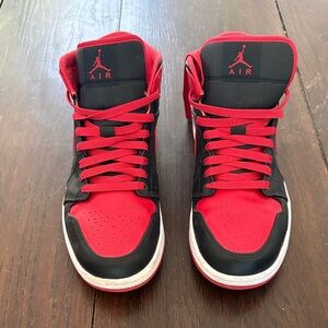 Red and Black Air Jordan high top Sneakers